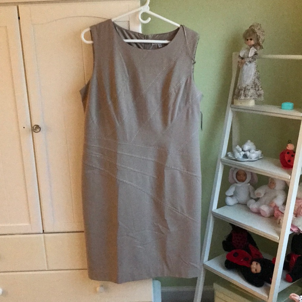 A tan sleeveless dress from Sandra Darren